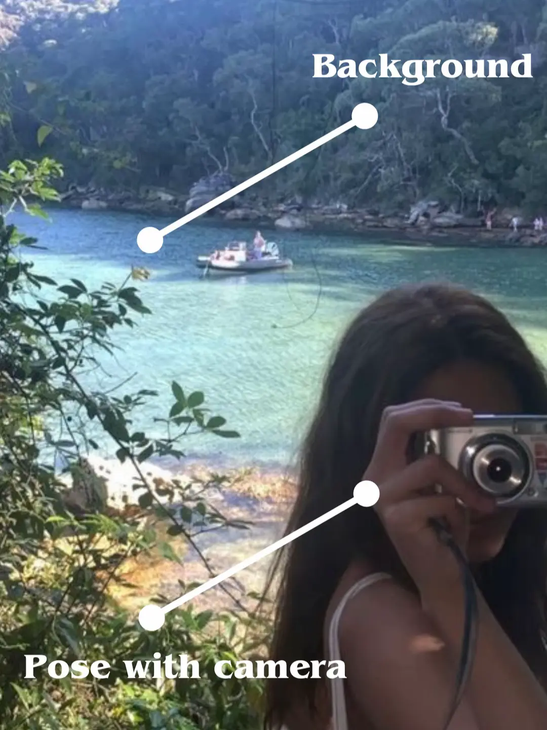  A woman is taking a picture of a lake.