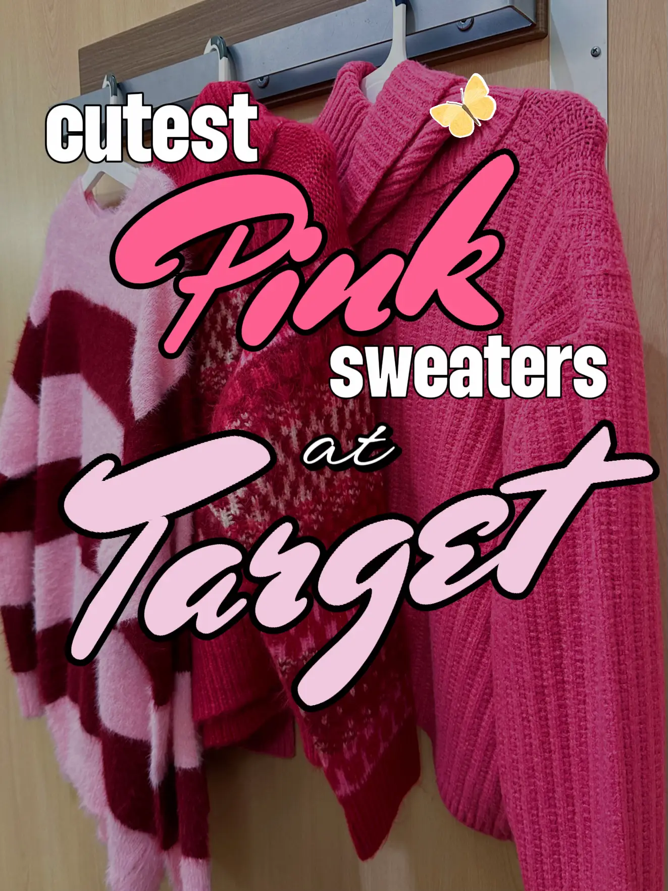  A rack of pink and white sweaters.