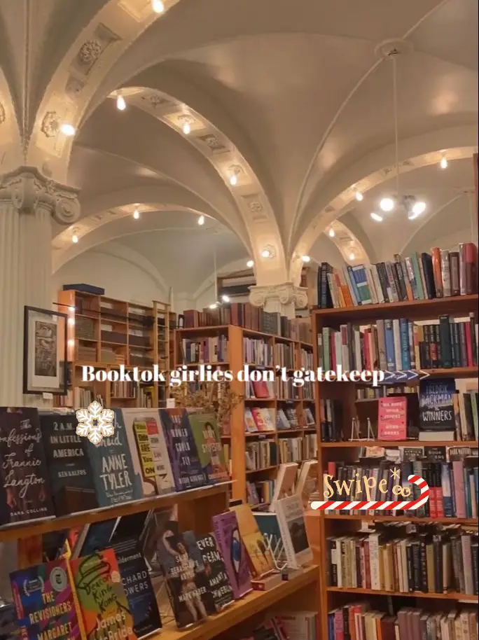  A bookshelf with a lot of books on it. The bookshelf is called "Bookshelf Girlies".