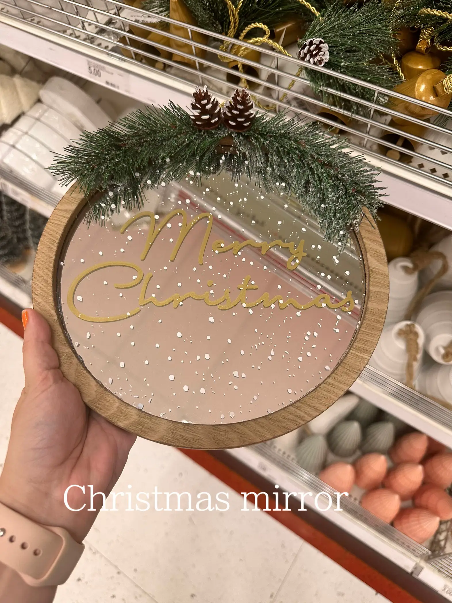  A Christmas mirror with a sign that says "Mirror".