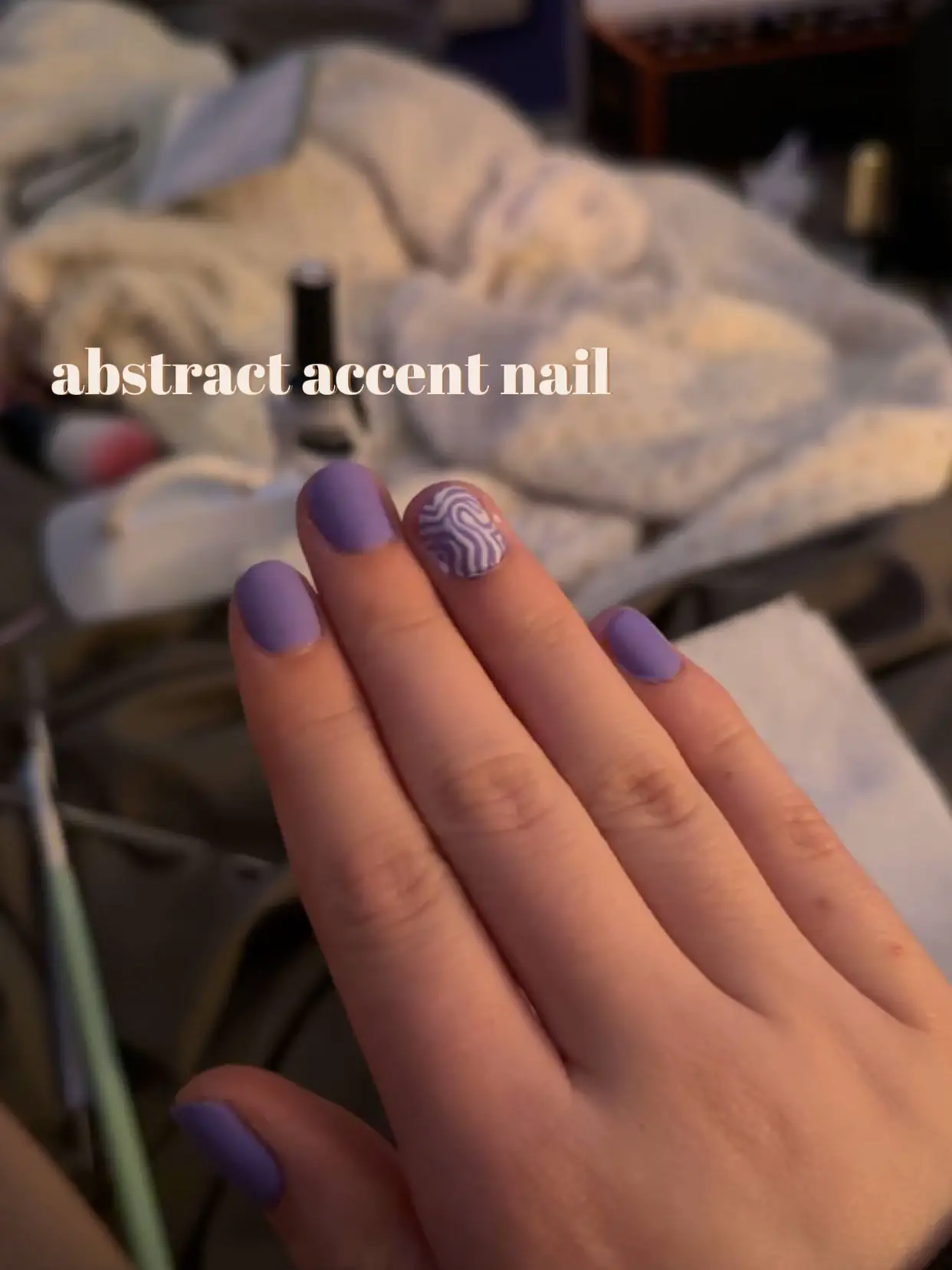 purple and white abstract accent nail